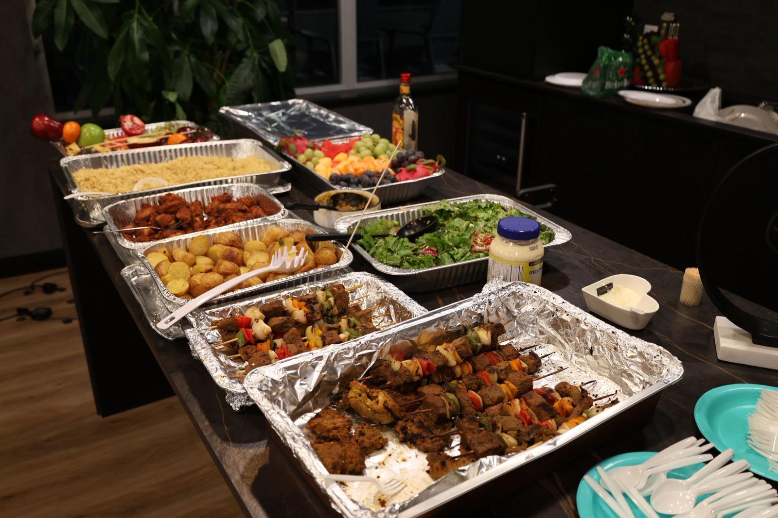 Catered food table at an Empower Youth Canada event.