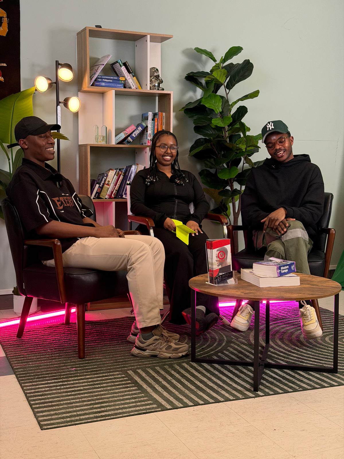 Three youth participants seated for a discussion in a cozy space.